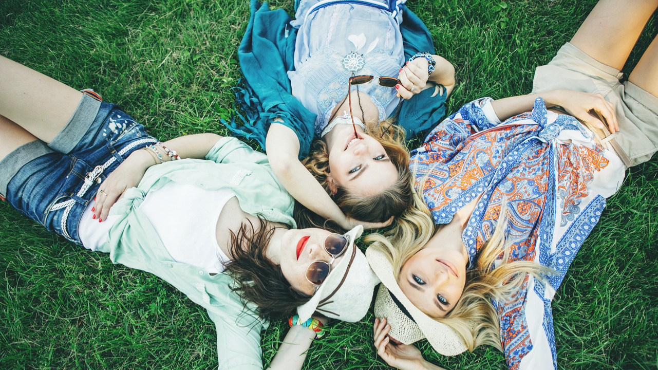 Digital Asset Management Title Image - 3 women on grass