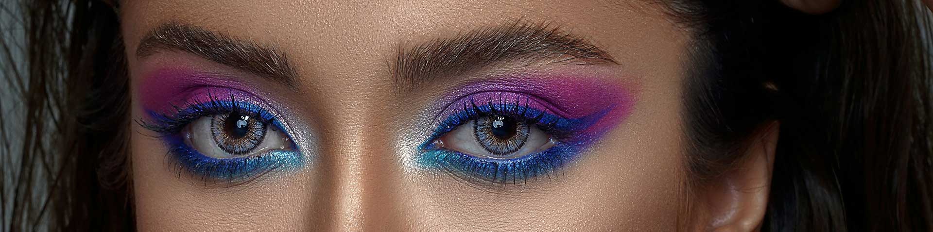 Purple and blue eye make-up on a woman as a symbolic image for blog article ‘The role of PIM in the beauty industry’