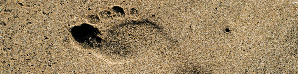 Fußabdruck im Sand
