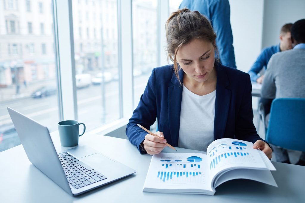 Head of marketing reading a white paper