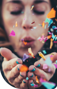 Woman holding confetti in her hands