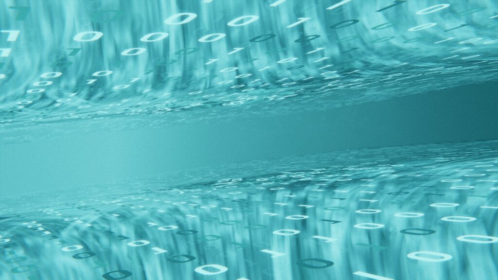 Abstract teal data stream flowing from a single source into multiple channels — symbolizing one product data foundation orchestrated into every touchpoint